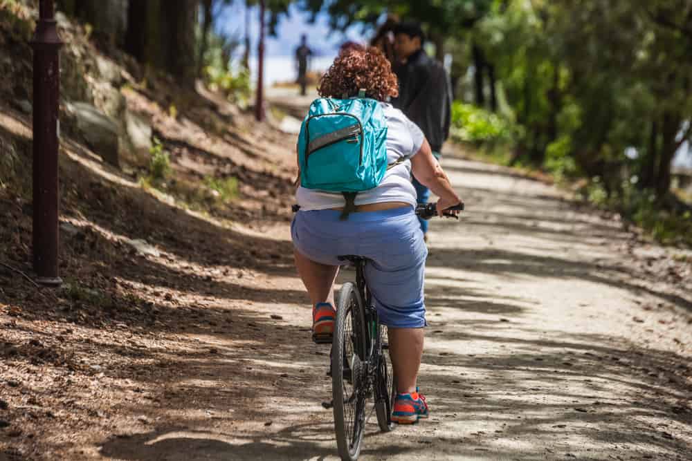 Obese woman on a bicycle