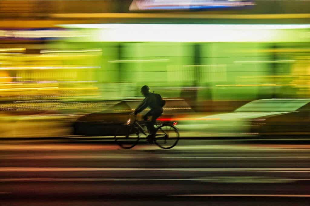 Man on a bicycle at night